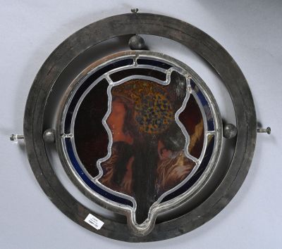 a picture of a picture of a woman in a hat on a ship wheel