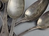 five spoons and two spoons on the table