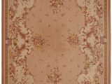 a beige and red rug with a floral design on it