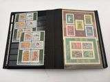 a book with a lot of different stamps on it