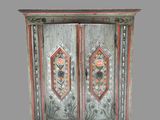 an image of a wooden cabinet with two doors and a floral design on it