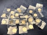 a pile of gold coins sitting on top of a table