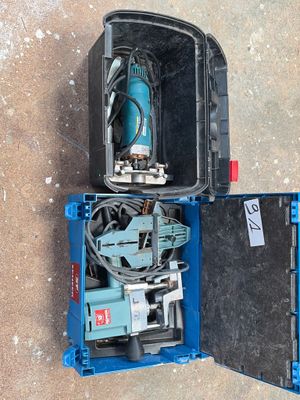 a blue box with a drill and other tools in it