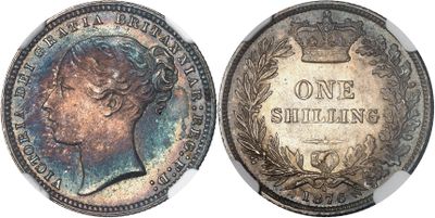 a close up of a coin with a crown on top of it
