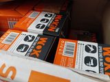 many boxes of orange and white items in a box