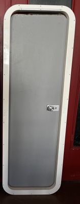 two doors that are next to each other on the wall