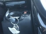 a close up of a car ' s dashboard with a key in it