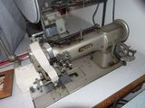 a sewing machine that is sitting on a table
