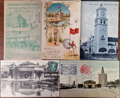 several old postcards of different buildings and buildings on a table
