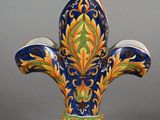 an image of a decorative vase with a blue and yellow design