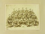 an old photo of a group of soldiers posing for a picture