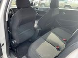 two seats in the back of a car that are empty