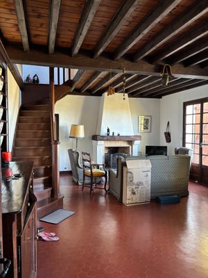 an image of a living room with a lot of furniture