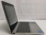 a laptop computer that is sitting on a table