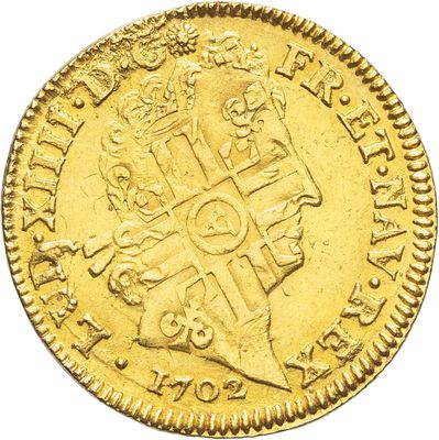 l'image d'une pièce d'or portant une croix