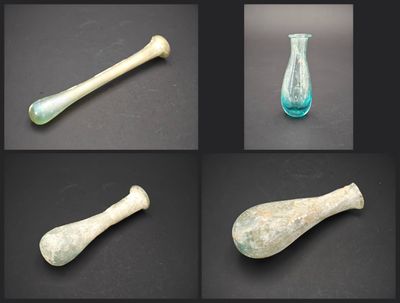 several different types of glass items displayed on a black surface