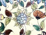 a painting of birds and flowers on the wall