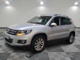 la volkswagen tiguan est garée sur un carrelage à carreaux