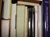 a box full of books that are sitting on a table