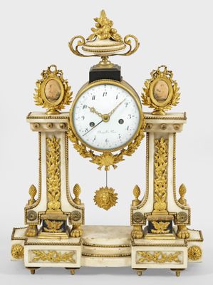 a clock that is sitting on top of a table
