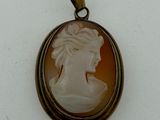 a picture of a picture of a woman in a cameo pendant
