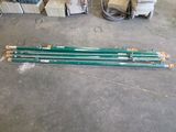 a lot of green pipes that are on the floor