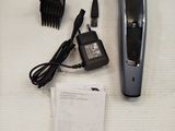 an image of a hair clipper and a hair brush