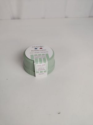 a roll of tape sitting on a white surface