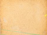 an old piece of paper with green and yellow paint on it