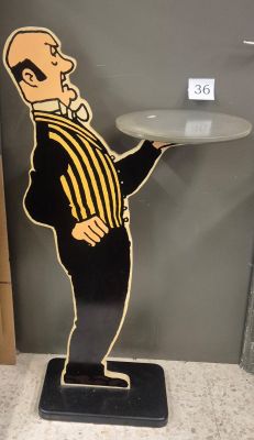 a picture of a man holding a tray in his hand