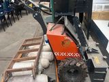 a small machine that is sitting in the middle of a room