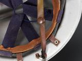 a white helmet with a blue ribbon on it