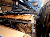 a picture of a machine that is working on a piece of wood
