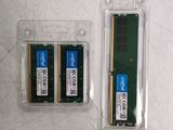 three ram modules in a plastic case next to each other