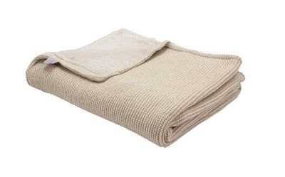 an image of a blanket folded up on a white background