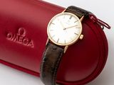 a watch sitting on top of a red case