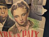 an old movie poster of a man and a woman smoking a cigarette
