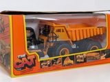 a box with a toy truck inside of it
