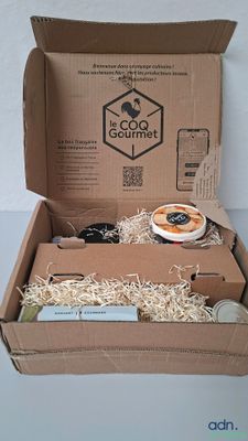 a cardboard box that has some items inside of it