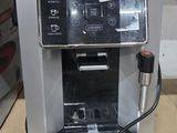 a coffee machine that is sitting on top of a table