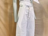 an image of a mannequin wearing a white dress
