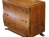 an image of a wooden chest of drawers on a white background