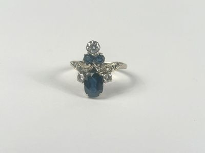 a close up of a ring on a white surface
