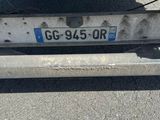 a close up of the back end of a truck with a license plate on it