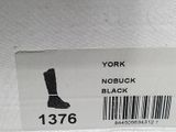 a picture of a black and white picture of a pair of boots