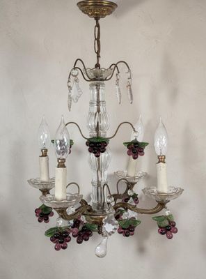a chandelier with a bunch of candles hanging from it
