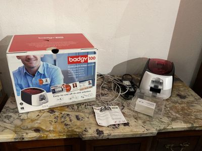 a box on a counter with a blender and other items on it