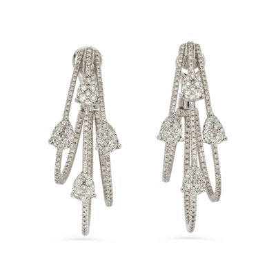 a pair of white gold and diamond earrings