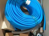 a blue hose and a blue can in a cardboard box