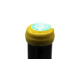 a close up of a bottle of wine on a white background